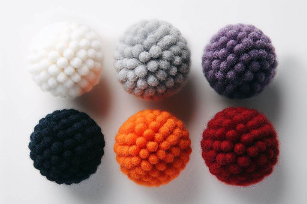 Range of 6 colors of small pompons